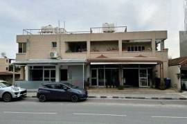 BUILDING ON BUSY ROAD WITH 2 SHOPS -LARGE UPPER PENTHOUSE- BASEMENT