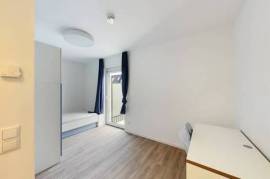 Fully furnished private room with bath & balcony for a male in a 6 people shared mixed apartment