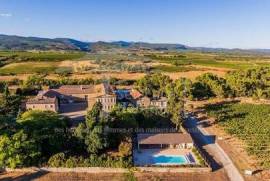 Superb Property from the 12 th century , organic 121 Acres , several residential houses, exploited vineyards, in the heart of the minervois...