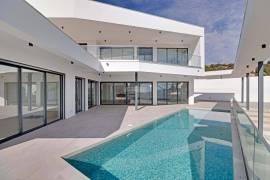 Luxurious contemporary 4 bedroom villa with heated pool and sea views situated in Albufeira Marina