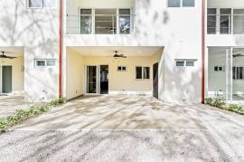 Jacarandas #22: Modern Townhome with Amenities Just Minutes from the Beach