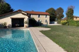 Restored farmhouse with pool & views close to market town