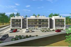 Building under construction with 2 and 3 bedroom apartments with swimming pool in Alvor