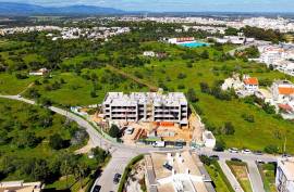Building under construction with 2 and 3 bedroom apartments with swimming pool in Alvor