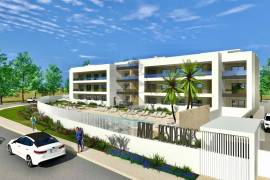 Building under construction with 2 and 3 bedroom apartments with swimming pool in Alvor