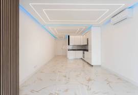Refurbished 2 bedroom apartment with storage room located on the 1st line of the sea in Quarteira