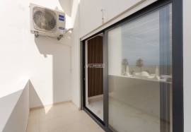 Refurbished 2 bedroom apartment with storage room located on the 1st line of the sea in Quarteira