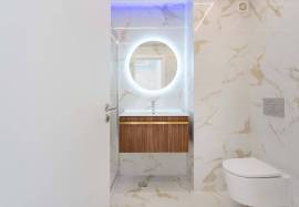 Refurbished 2 bedroom apartment with storage room located on the 1st line of the sea in Quarteira