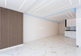 Refurbished 2 bedroom apartment with storage room located on the 1st line of the sea in Quarteira
