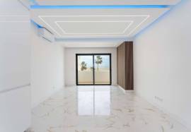 Refurbished 2 bedroom apartment with storage room located on the 1st line of the sea in Quarteira