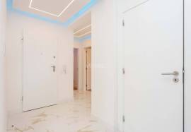 Refurbished 2 bedroom apartment with storage room located on the 1st line of the sea in Quarteira