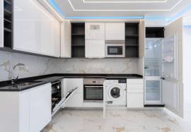 Refurbished 2 bedroom apartment with storage room located on the 1st line of the sea in Quarteira