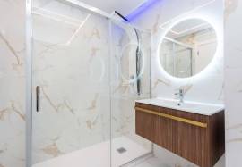 Refurbished 2 bedroom apartment with storage room located on the 1st line of the sea in Quarteira