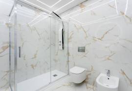 Refurbished 2 bedroom apartment with storage room located on the 1st line of the sea in Quarteira
