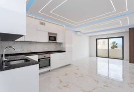 Refurbished 2 bedroom apartment with storage room located on the 1st line of the sea in Quarteira