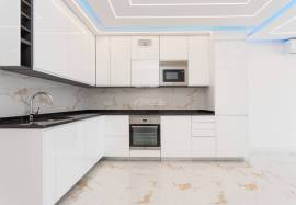 Refurbished 2 bedroom apartment with storage room located on the 1st line of the sea in Quarteira