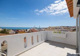 Stunning Renovated Three-Level Townhouse with Ocean Views in the Heart of Lagos