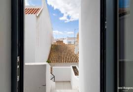Stunning Renovated Three-Level Townhouse with Ocean Views in the Heart of Lagos