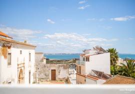 Stunning Renovated Three-Level Townhouse with Ocean Views in the Heart of Lagos