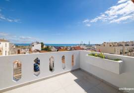 Stunning Renovated Three-Level Townhouse with Ocean Views in the Heart of Lagos