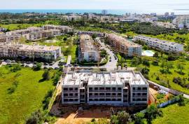 Building under construction with 2 and 3 bedroom apartments with swimming pool in Alvor