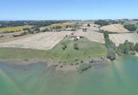 House for restoration with massive glazed barn with planning permission in fantastic lakeside position with mountain views
