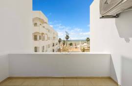 2-Bedroom Apartment with Sea View in Frontline Location by the Beach in Quarteira