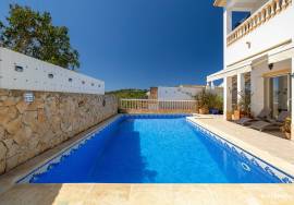 Spacious 4-Bedroom Family Home with Pool