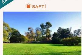 Très grand terrain constructible « libre de constructeur »