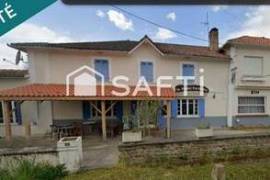 Espace commercial + 2 appartements
