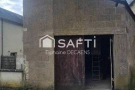 garage avec mezzanine, pouvant devenir un logement