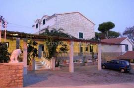Villa with apartments, sea view, and pool, for sale