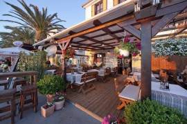 Traditional seafront stone house with restaurant, for sale