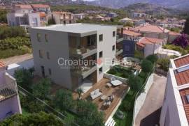 Dreizimmerwohnung mit Terrasse und Garten, im Bau, zu verkaufen