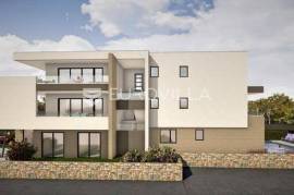 Krk, luxury apartment in a new building, center of Njivice, first row to the sea NKP 140 m2