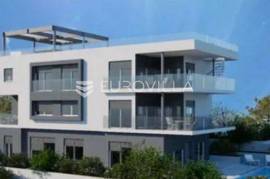 Okrug Gornji, three-room penthouse with a roof terrace and a view of the sea