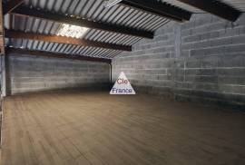 Large Garage with Many Possibilities