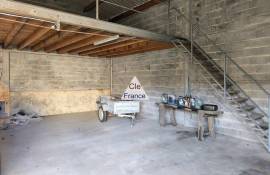 Large Garage with Many Possibilities