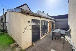 Maison avec jardin, garage et 3 chambres