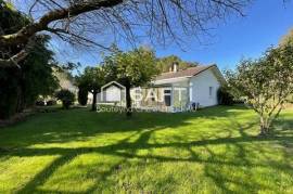 Maison plain-pied avec 2 chambres et garage sur parcelle de 5215m2
