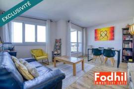 Appartement 4 pièces de 75 m² avec cave et parking en sous-sol.