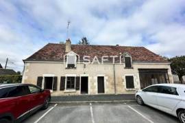 Maison avec beau potentiel locatif.