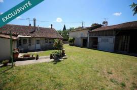 Maison 4 chambres prête à vivre , 2 garages et dépendances !