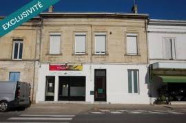Immeuble rénové avec local commercial et appartements