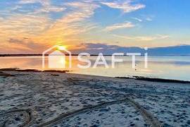 Terrain à bâtir + bâti existant