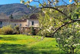 Former 17th Century Stone Watermill Set In Greenery