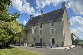 Superb château with vast outbuildings and heated pool
