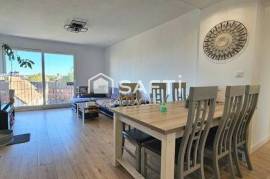 Appartement 75m2 avec grand jardin, garage et 2 parkings+ cave.