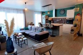 Les Richardières - Appartement T3 : 2 chambres, balcon, ascenseur.