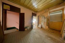 Unique Investment Opportunity in the Heart of Portimão with Rehabilitation Potential